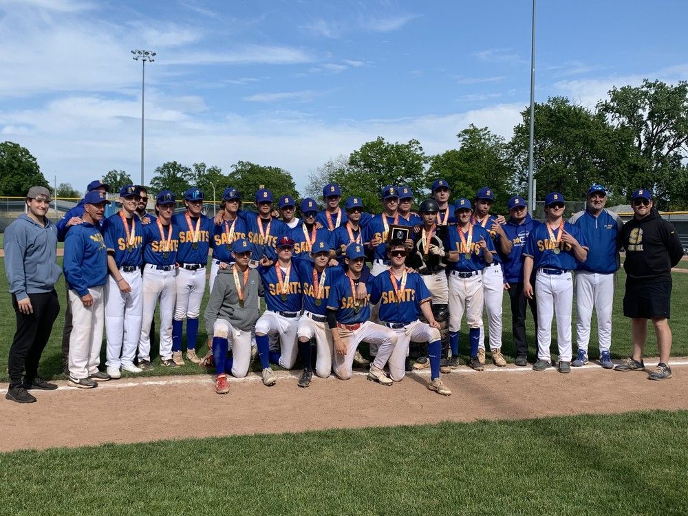 the st. anne saints celebrate after capturing the team's first swossaa baseball title since 2017 on tuesday after beating the wallaceburg tartans 5-1 at lacasse park.