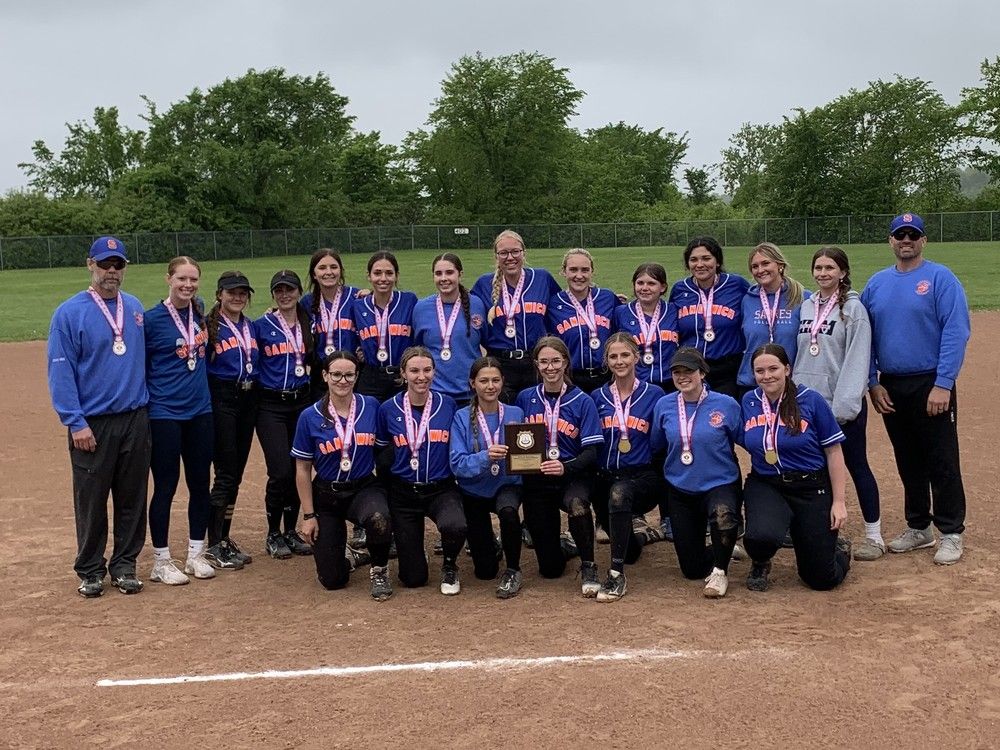 the sandwich sabres celebrate after capturing the wecssaa slo-pitch title on wednesday at co-an park after beating the leamington lions 12-9.