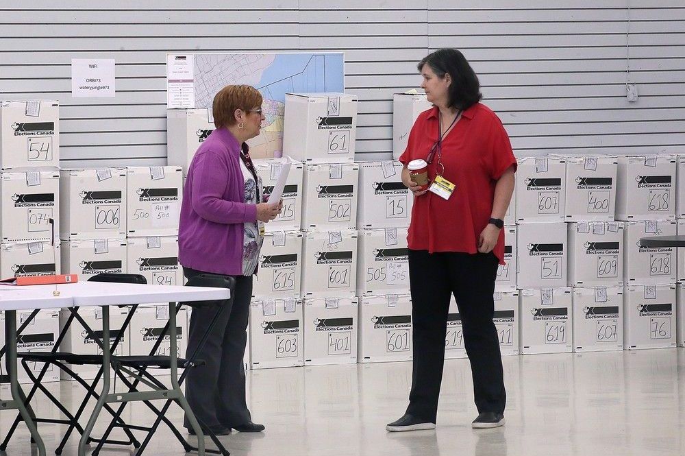 Elections Canada staff are shown at the returning office in Tecumseh on Wednesday, May 21, 2025, amid a recount for Windsor-Tecumseh-Lakeshore. Elections Canada staff are shown at the returning office in Tecumseh on Wednesday, May 21, 2025, amid a recount for Windsor-Tecumseh-Lakeshore.
