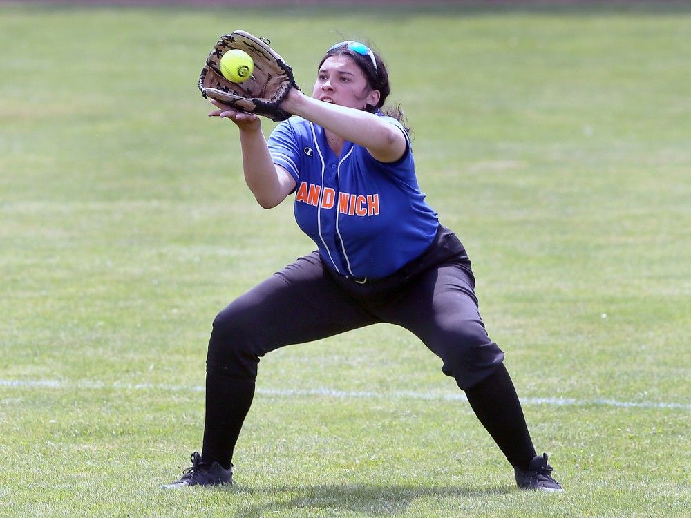  sandwich sabres’ outfielder breslynn bankscatches a ball during the ofsaa slo-pitch gold medal game at mic mac park.