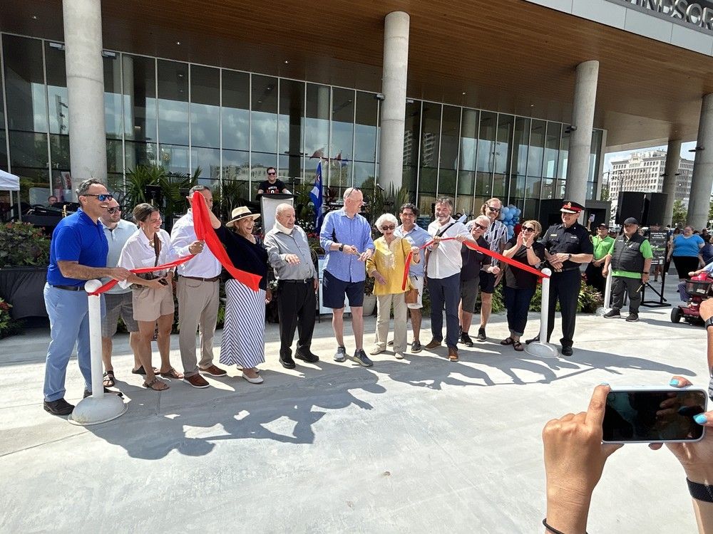  windsor, sunday, july 13, 2025 – windsor mayor drew dilkens, members of city council, and other officials cut the ribbon on the new city hall square space on sunday, july 13, 2025. (brian macleod/windsor star)
