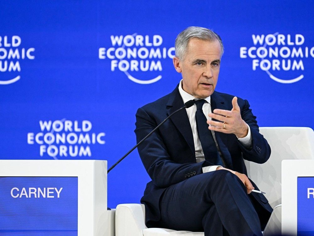 Canada's Prime Minister Mark Carney gestures as he speaks during the World Economic Forum (WEF) annual meeting in Davos on January 20, 2026.