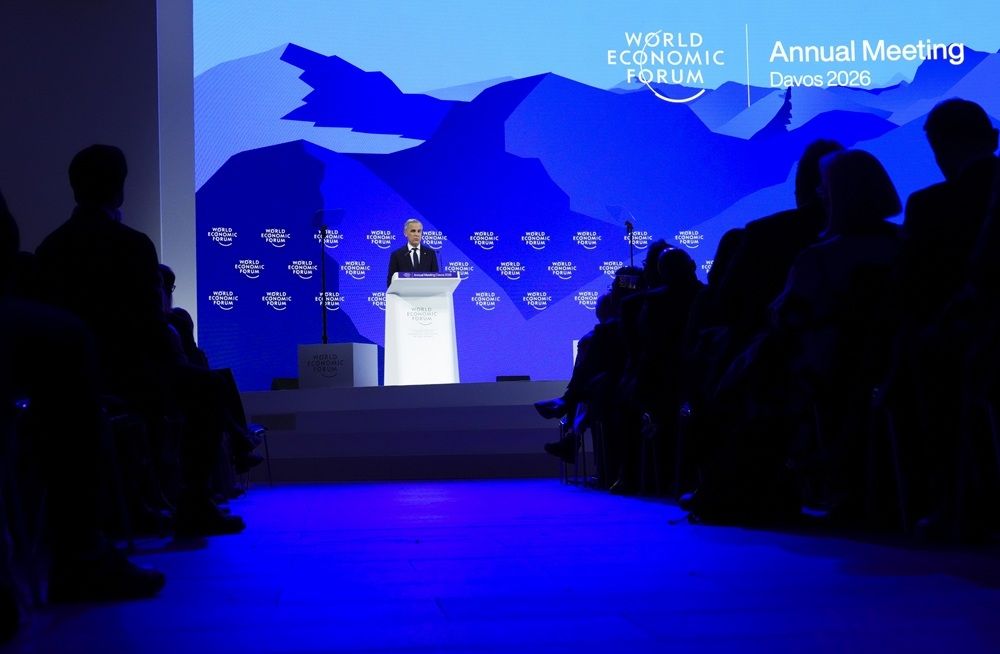 Prime Minister Mark Carney delivers a speech at the World Economic Forum in Davos, Switzerland on Tuesday, Jan. 20, 2026.