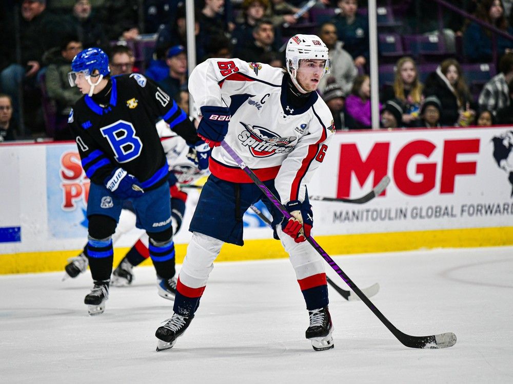 Windsor Spitfires' captain Liam Greentree looks for the puck during Saturday's game against the Brampton Steelheads at the CAA Centre.