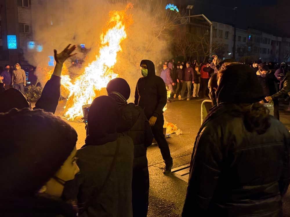 Iranians attend an anti-government protest in Tehran, Iran, Friday, Jan. 9, 2026.