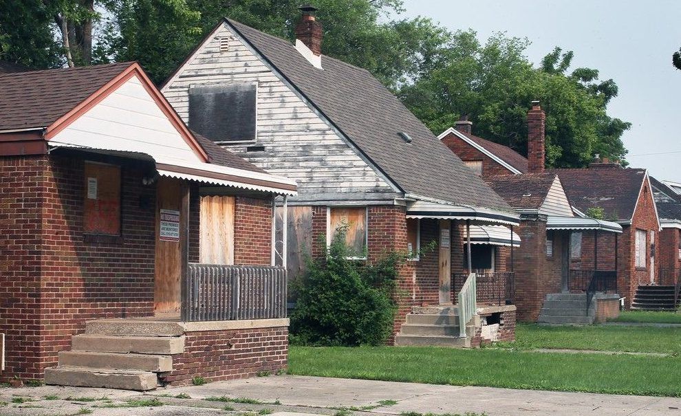  Long-abandoned and boarded-up homes along Windsor’s Indian Road, owned by the Ambassador Bridge company, are shown on July 17, 2023.