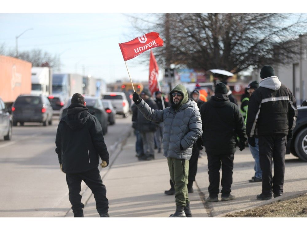 Locked-out workers at Titan Tool &amp; Die have blocked transport trucks along Howard Avenue