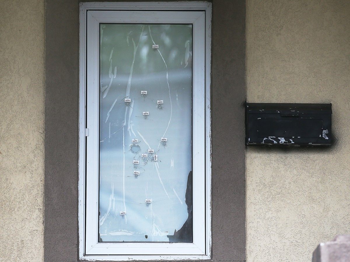 Windsor police are investigating whether shots fired at a home on Monday were connected to fatal weekend stabbing death of a teenager.