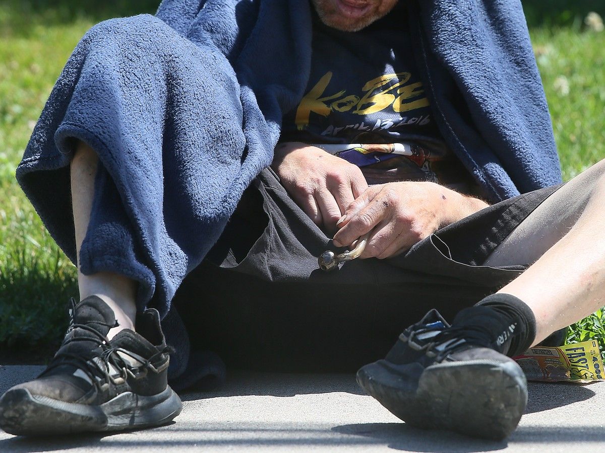 Windsor police are focusing more attention on a small area downtown notorious for open drug use but aren't laying arrests for the act.