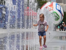 Stephania Grishina, 5, cools down at the FIFA World Cup 2026 Event