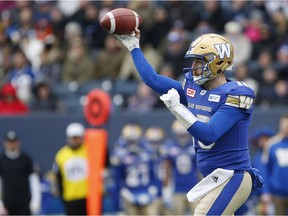 Winnipeg Blue Bombers  quarterback Matt Nichols (15) throws against the BC Lions during the first half of CFL action in Winnipeg Saturday, October 28, 2017. The Blue Bombers' quest for an elusive home playoff game might've hit a snag. Starter Matt Nichols is questionable for Friday night's regular-season finale at Calgary after suffering a leg injury in Saturday night's 36-27 home loss to B.C. THE CANADIAN PRESS/John Woods ORG XMIT: JGW500

Oct.28, 2017 file photo
John Woods,