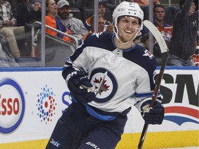 Winnipeg Jets forward Nikolaj Ehlers will have his hands full with Colorado Avalanche defenseman Erik Johnson, who is averaging nearly 26 minutes each game. THE CANADIAN PRESS/Jason Franson