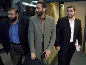 Abdullah Almalki Muayyed Nurdedin Ahmad El Maati

Abdullah Almalki, right to left, Muayyed Nureddin and Ahmad El-Maati arrive at a news conference in Ottawa Tuesday Oct.21, 2008. Three Canadians who were tortured in Syria have received a total of $31 million in federal compensation. THE CANADIAN PRESS/Adrian Wyld ORG XMIT: CPT109

Eds. note an Oct.21, 2008 file photo
Adrian Wyld,