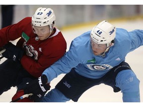 Forward Brendan Lemieux (right) forces defenceman Nelson Nogier to go wide during Winnipeg Jets training camp at Bell MTS IcePlex on Sun., Sept. 17, 2017. Kevin King/Winnipeg Sun/Postmedia Network
Kevin King, Kevin King/Winnipeg Sun