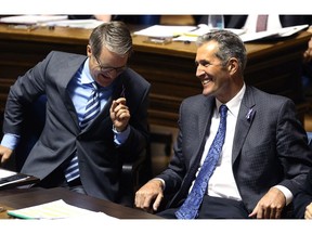 Premier Brian Pallister (right) shares a laugh with finance minister Cameron Friesen during question period at the Manitoba Legislature in Winnipeg on Mon., Oct. 23, 2017. Kevin King/Winnipeg Sun/Postmedia Network
Kevin King, Kevin King/Winnipeg Sun