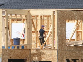 New home construction is seen in the Sage Creek neighbourhood of Winnipeg, Man. Tuesday September 06, 2016. Qualico has delayed a 63 lot expansion in the area until the city makes a decision on the new growth fees. Brian Donogh/Winnipeg Sun/Postmedia Network