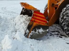 Clearing snow from the road.

Getty Images