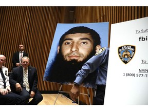 A picture of suspect Sayfullo Saipov is displayed during a news conference about yesterday's attack along a bike path in lower Manhattan that is being called a terrorist incident on Nov. 1, 2017 in New York City. (Spencer Platt/Getty Images) Spencer Platt, Getty Images