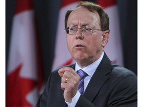 NDP MP Murray Rankin speaks to the media in Ottawa in this April 9, 2013 file photo. (Andre Forget/Postmedia Network)