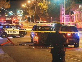 Police investigate the scene where a car crashed into a roadblock in Edmonton Alta, on Saturday September 30, 2017. The RCMP unit that investigates threats to national security is asking citizens to share any video or pictures they have of the attacks on Saturday in Edmonton that injured a police officer and four pedestrians. THE CANADIAN PRESS/Jason Franson ORG XMIT: CPT132

EDS NOTE A FILE PHOTO
JASON FRANSON,