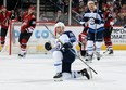 Jets’ Matt Hendricks celebrates after scoring a goal against the Phoenix Coyotes during the second period in Glendale, Ariz.