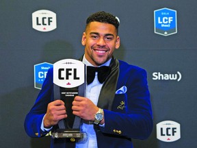 Winnipeg Blue Bombers running back Andrew Harris, recipient of the Most Outstanding Canadian award, poses backstage at the CFL awards in Ottawa on Thursday, Nov. 23, 2017. THE CANADIAN PRESS/Nathan Denette