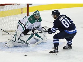 Winnipeg Jets' Kyle Connor (81) misses a penalty shot against Dallas Stars goaltender Ben Bishop (30) during third period NHL action in Winnipeg on Thursday, November 2, 2017. THE CANADIAN PRESS/John Woods ORG XMIT: JGW120
JOHN WOODS,