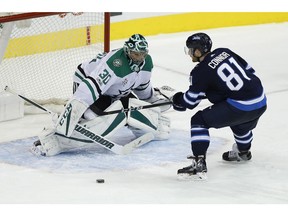 Winnipeg Jets' Kyle Connor (81) misses a penalty shot against Dallas Stars goaltender Ben Bishop (30) during third period NHL action in Winnipeg on Thursday, November 2, 2017. THE CANADIAN PRESS/John Woods ORG XMIT: JGW120
JOHN WOODS,