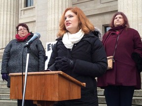 Dietitian Lindsey Mazur speaks at a rally outside the Manitoba legislature in Wiinipeg on Wednesday, Nov. 23, 2016. THE CANADIAN PRESS/Steve Lambert