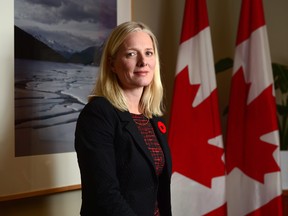 Minister of Environment and Climate Change Catherine McKenna poses for a photo in her office on Parliament Hill in Ottawa on Tuesday Nov. 7, 2017.