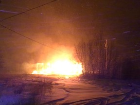 A house in Oxford House First Nation burns on Nov. 16, 2017.