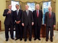 Then- U.S. President George W. Bush (C) meets with then-President-elect Barack Obama (2nd-L), former President Bill Clinton (2nd-R), former President Jimmy Carter (R) and former President George H.W. Bush (L) in the Oval Office in Washington, D.C. in this Jan. 7, 2009 file photo. (Mark Wilson/Getty Images)