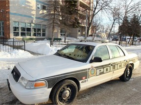 A Winnipeg Police cruiser sits outside a housing complex in the 100 block of Stadacona Street in Winnipeg, Man. Wednesday January 29, 2014 after a 41 year old woman was found outside the block early in the morning. The woman later died. Brian Donogh/Winnipeg Sun/QMI Agency
Brian Donogh, Brian Donogh/Winnipeg Sun/QMI Agency