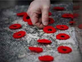 Remembrance Day

Poppies are placed on a cenotaph during a Remembrance Day service in Winnipeg, Saturday, November 11, 2017. THE CANADIAN PRESS/John Woods