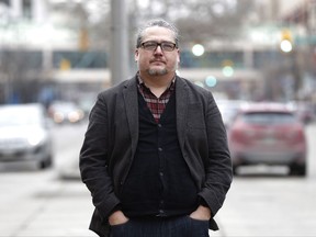 Tim Fontaine, who produces walkingeaglenews.com, a satirical online site featuring, as he says, "the finest in indigenous news" is photographed in downtown Winnipeg, Monday, November 27, 2017. THE CANADIAN PRESS/John Woods