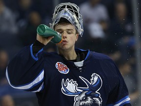 Manitoba Moose goaltender Eric Comrie was recalled by the Jets Monday, Nov. 27, 2017 to replace injured goalie Steve Mason. Kevin King/Winnipeg Sun Files