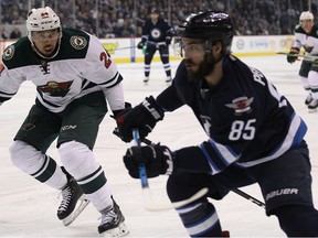 Mathieu Perreault (right) realizes he got off lucky to not suffer an injury and he’s happy the NHL department of player safety came down with a lengthy suspension for Philadelphia Flyers defenceman Radko Gudas.