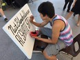 Rene Marriott, an artist at Graffiti Art Programming at Studio 393, does a live painting at The Forks in Winnipeg on Monday, July 31, 2017, on behalf of Nuit Blanche, one of the organizations that received funding from the Downtown BIZ through its three-year-old Host It Downtown program.