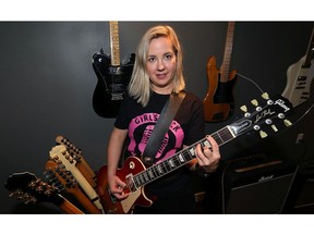 Brandi Olenick, founder of Girls Rock Winnipeg and guitarist for Off Henderson, is photographed in her Fort Garry home on Wed., Nov. 1, 2017. Kevin King/Winnipeg Sun/Postmedia Network
Kevin King, Kevin King/Winnipeg Sun