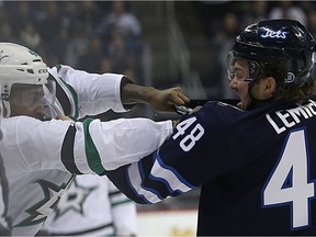 Winnipeg Jets forward Brendan Lemieux (right) scraps Dallas Stars centre Gemel Smith in Winnipeg on Thursday.