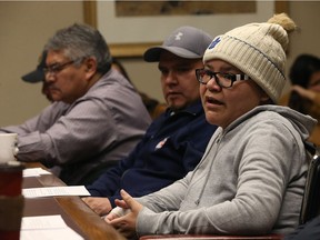 Melodie Harper (right) speaks during a press conference at the Manitoba Legislative Building in Winnipeg on Monday, to address health care concerns. Her husband Vernon is at centre, with St. Theresa Point First Nation chief David McDougall at far left.