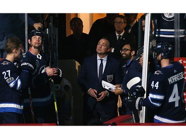 Former Winnipeg Jets great Dale Hawerchuk watches a video tribute prior to his induction into the Winnipeg Jets Hockey Hall of Fame before puck drop against the Phoenix Coyotes in Winnipeg on Tues., Nov. 14, 2017. Kevin King/Winnipeg Sun/Postmedia Network ORG XMIT: POS1711142014553327
Kevin King, Kevin King/Winnipeg Sun