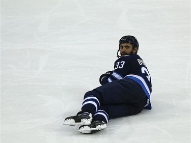 Winnipeg Jets defenceman Dustin Byfuglien wonders how he got called for a penalty while laying on the ice against the Phoenix Coyotes in Winnipeg on Tues., Nov. 14, 2017. Kevin King/Winnipeg Sun/Postmedia Network
Kevin King, Kevin King/Winnipeg Sun