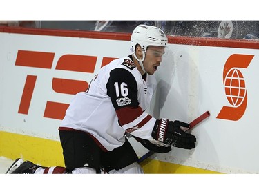 A woozy Phoenix Coyotes forward Max Domi tries to get to his feet during NHL action against the Winnipeg Jets in Winnipeg on Tues., Nov. 14, 2017. Kevin King/Winnipeg Sun/Postmedia Network
Kevin King, Kevin King/Winnipeg Sun