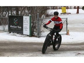 A fat bike rider exits Windsor Park Nordic Centre, which doesn't yet have enough snow to officially open, in Winnipeg on Mon., Nov. 20, 2017. Kevin King/Winnipeg Sun/Postmedia Network
Kevin King, Kevin King/Winnipeg Sun