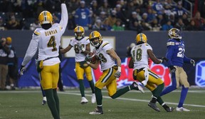 Eskimos receiver Brandon Zylstra (centre) celebrates a touchdown during the  West semifinal  against the Blue Bombers in Winnipeg on Sunday. (Kevin King/Winnipeg Sun)