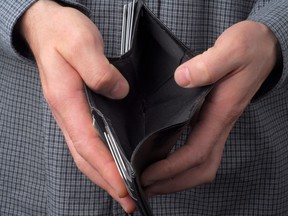 Person hold an empty wallet. Getty Images/iStockphoto