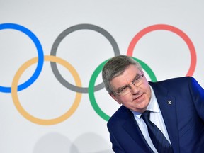 International Olympic Committee (IOC) President Thomas Bach arrives to a press conference closing an IOC executive meeting on December 6, 2017 in Lausanne. Analysts praised the International Olympic Committee on December 6 for being "brave" and "strong" in banning Russia from the 2018 Winter Games in South Korea. Although Russian athletes will be allowed to compete in Pyeongchang under the Olympic flag, and under strict conditions, the move to exclude a country over doping by the IOC on Tuesday was unprecedented. / AFP PHOTO / Fabrice COFFRINIFABRICE COFFRINI/AFP/Getty Images