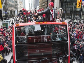 Toronto FC midfielder Michael Bradley gives thumbs-up to the crowd during Toronto FC parade on Dec. 11, 2017