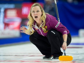 Skip Chelsea Carey reacts to her shot entering the house during Olympic curling trials action against Team Scheidegger on Dec. 4, 2017